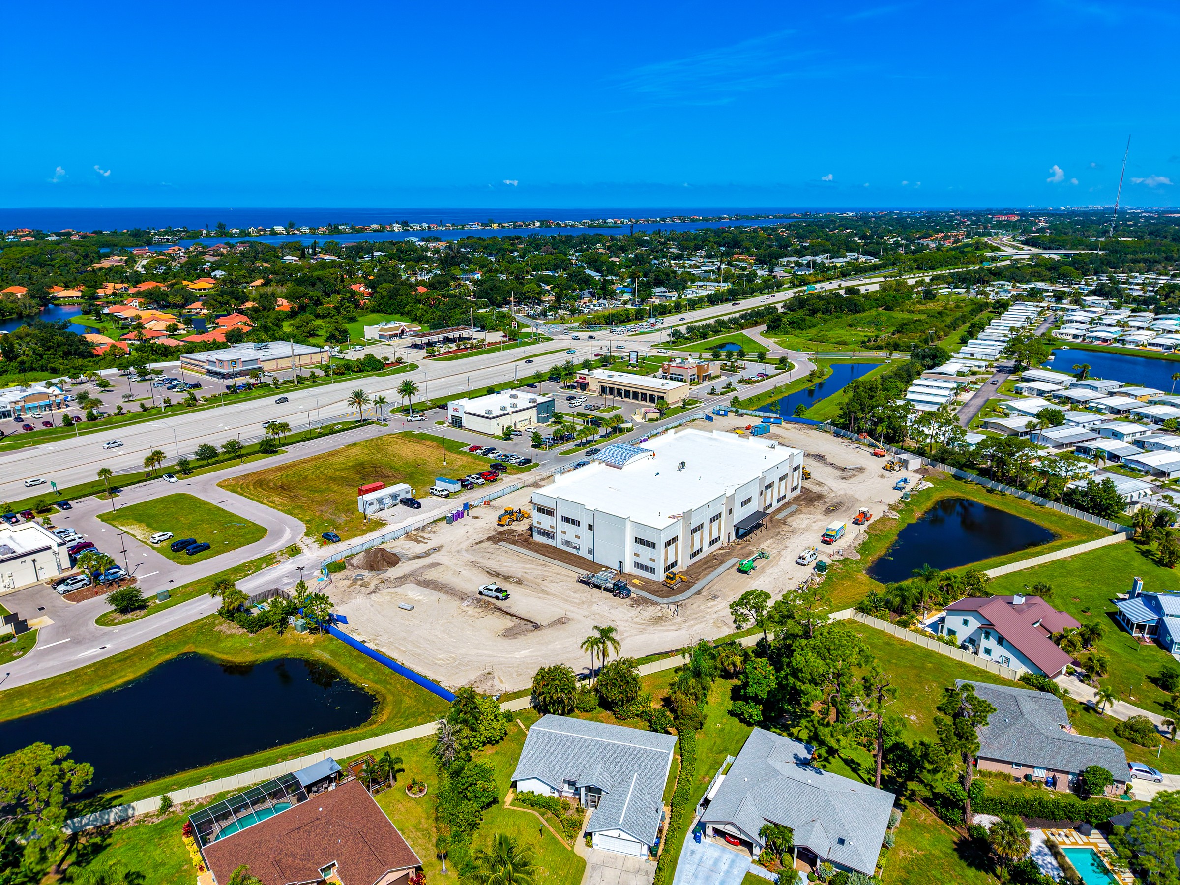 Aerial view of Coastal Wellness Center on North Tamiami Trail, Sarasota, Florida — August 2026